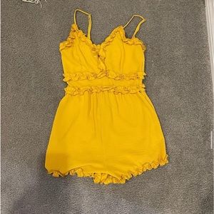 Yellow ruffled romper